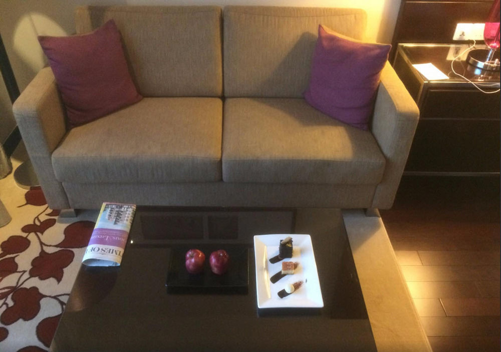 Jaipur Marriott Hotel Exterior photo A sofa in a hotel room